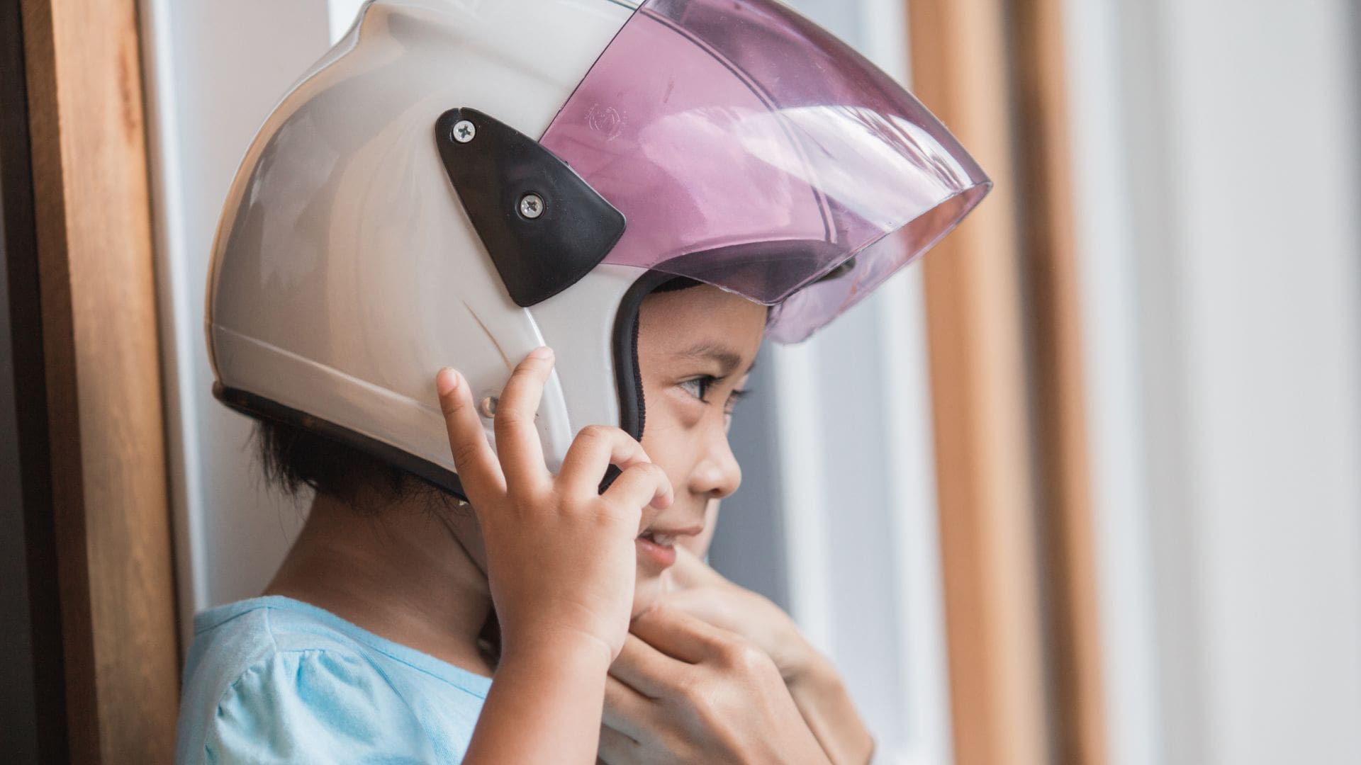 A kid wearing a helmet