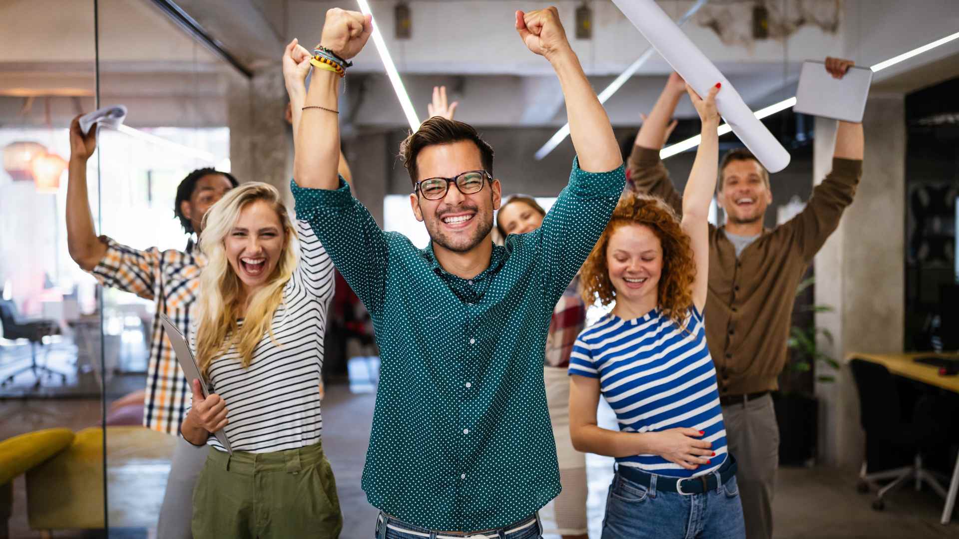 Employees happy after receiving their workplace first aid training.