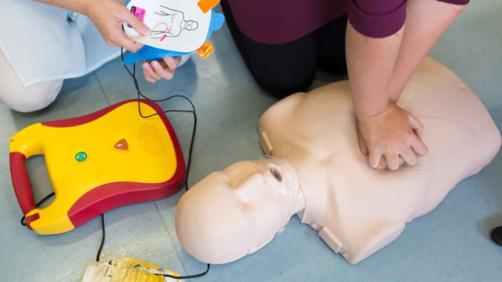 CPR and AED demonstration on a mannequin 